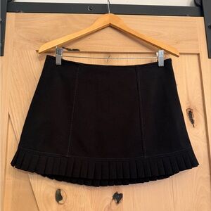 BCBGirls Black Mini Skirt with Pleated Hem